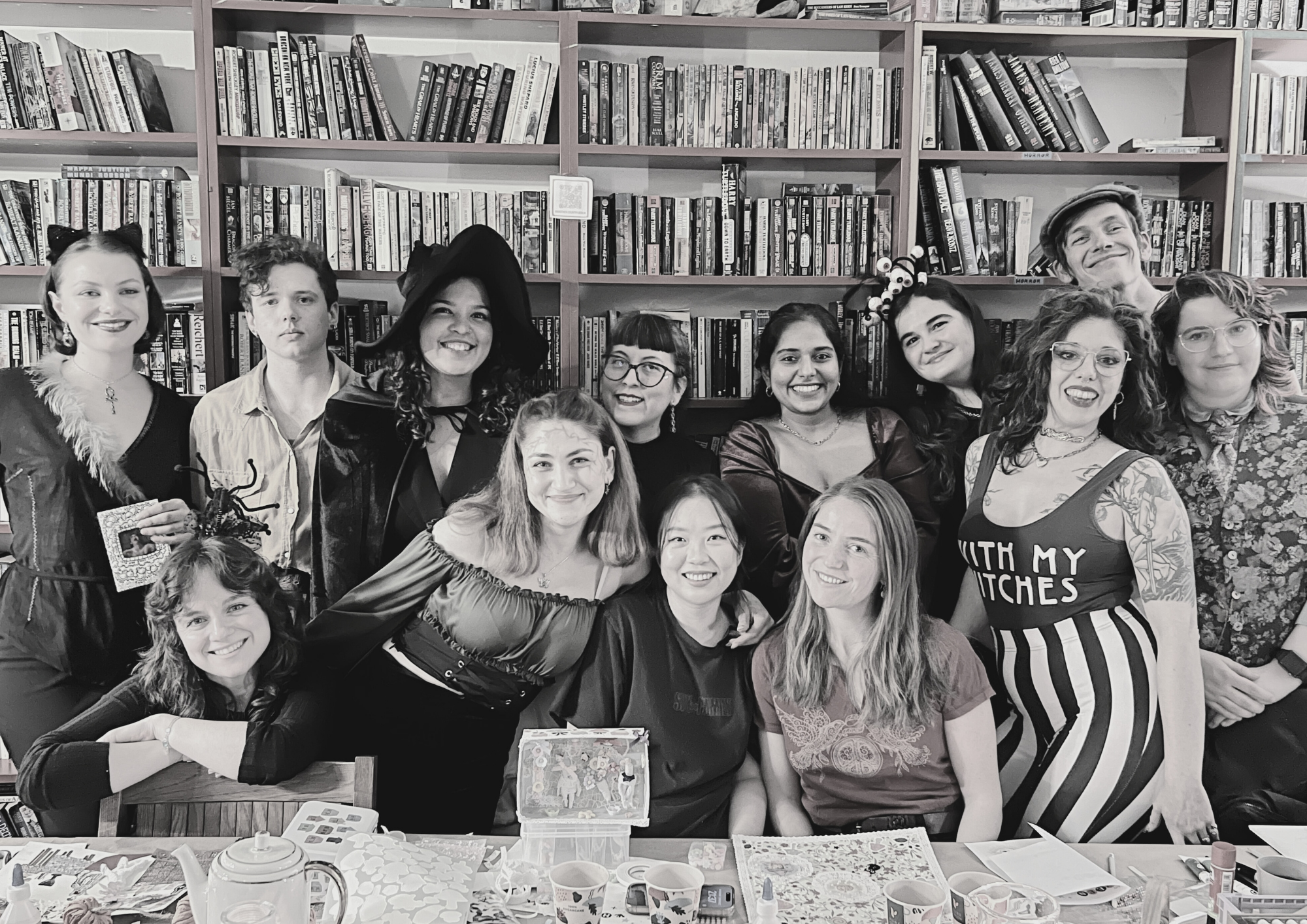 Black and white photograph of Halloween craft night of members of a creative club in Berlin