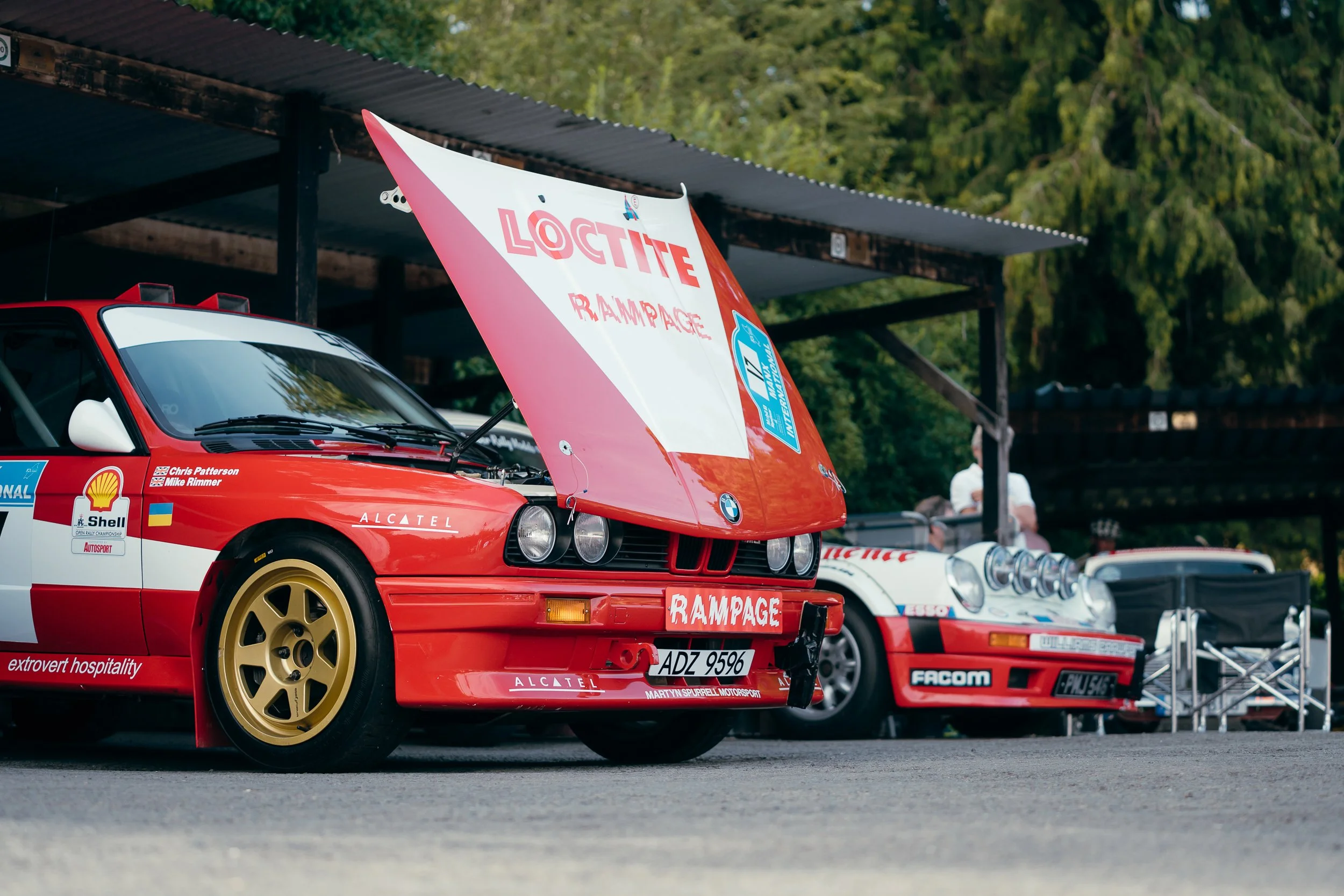 Red rally car with Loctite livery on display at Shelsley Walsh Classic Nostalgia