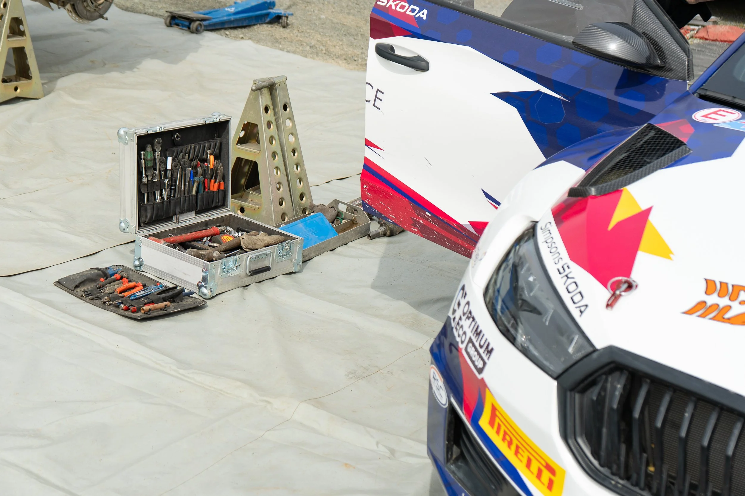 Rally car front end with an open toolbox in the service area at the British Rally Championship Severn Valley Stages