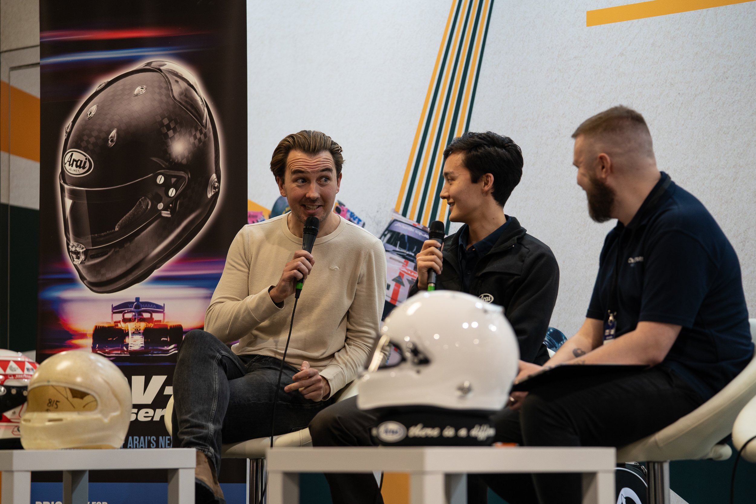 Panel discussion with racing drivers on stage at the Race Retro classic motorsport show