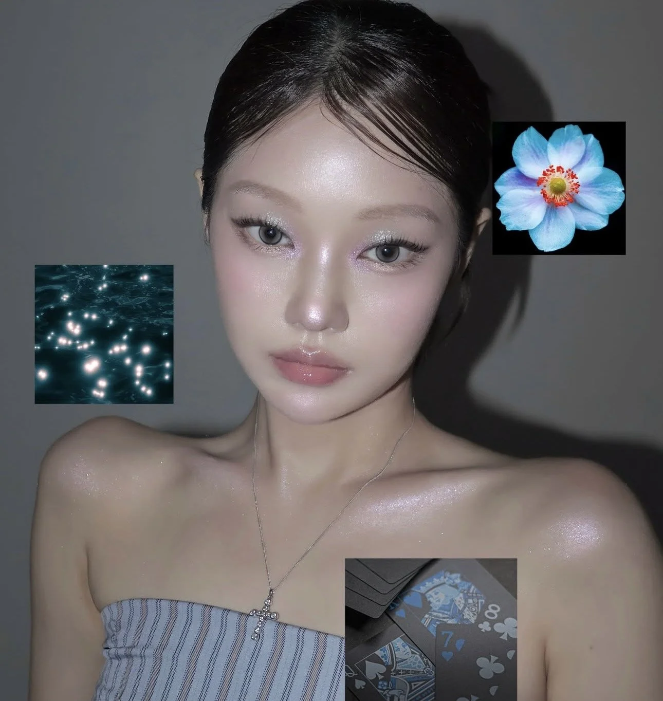 A young woman with wet hair and shimmering makeup posing for a photo with various floating images of a blue flower, glowing water, playing cards, and a cross necklace.