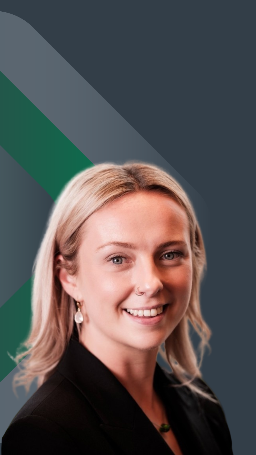 Portrait of a woman with blonde hair, smiling, wearing earrings and a black blazer, against a dark background with green and gray diagonal stripes.