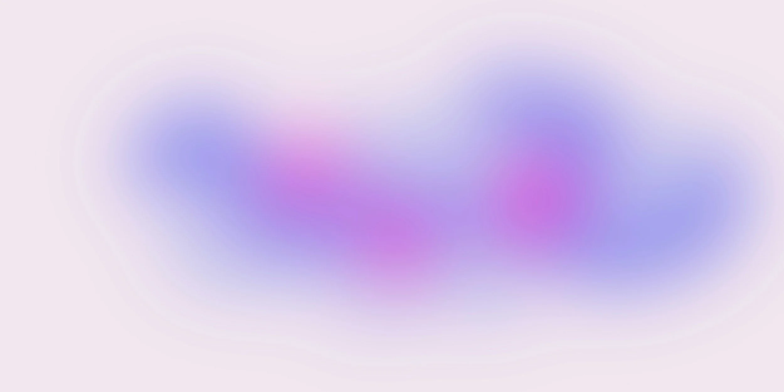 Soft pastel abstract background with blurred pink, purple, and blue hues.
