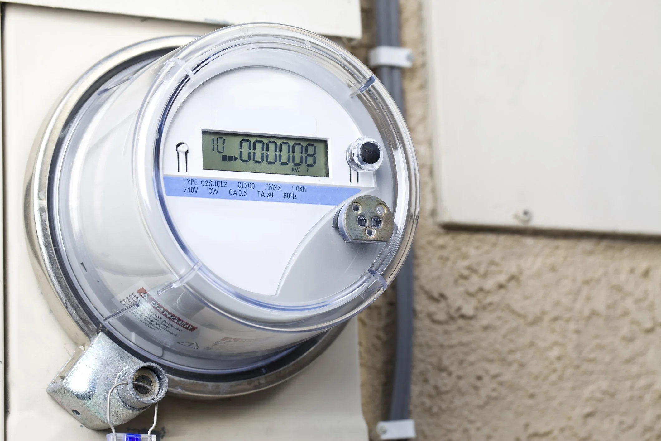 Close-up of a digital electricity meter showing a kWh reading.