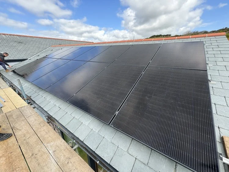 A solar panel installation on the roof of a house located in Thanckes House, Polbathic
