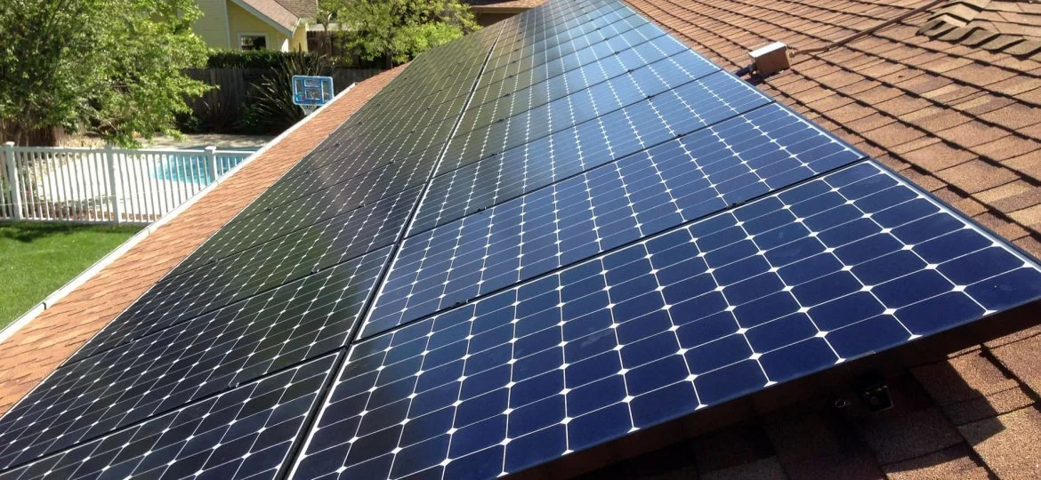 Solar panels installed on a sloped rooftop.