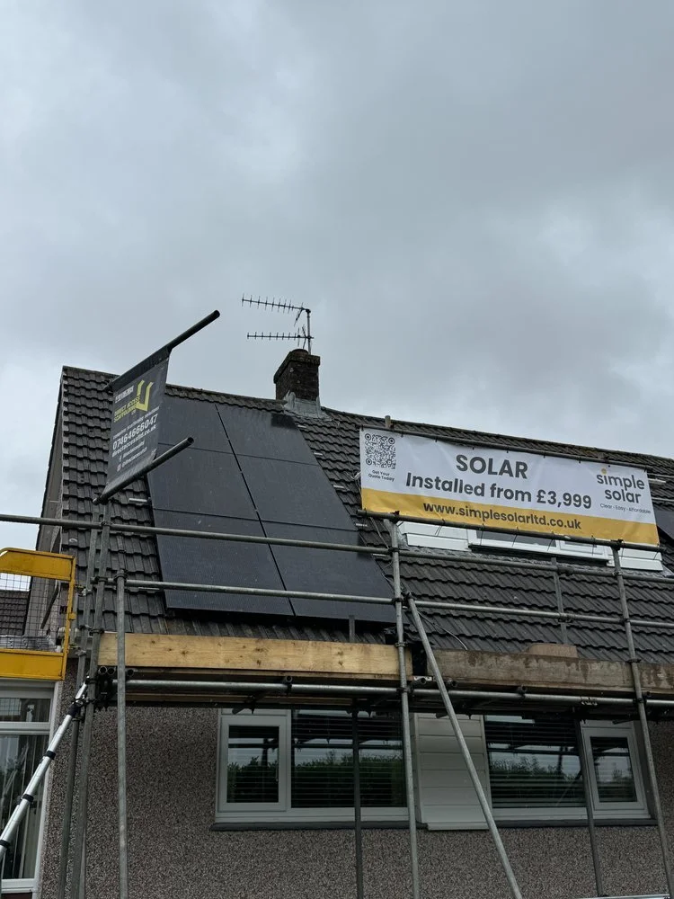 A solar panel installation on the roof of a residential property with scaffolding from Simple Solar Ltd.