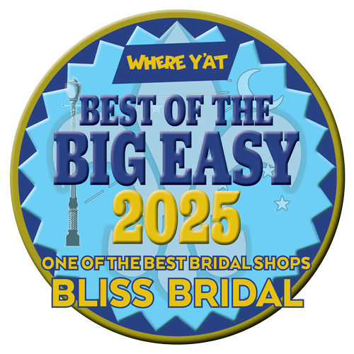 A circular badge with blue background and yellow and dark blue text, promoting Bliss Bridal as one of the best bridal shops in 2025, titled "Best of the Big Easy 2025", with the phrase "Where Y'at" at the top.