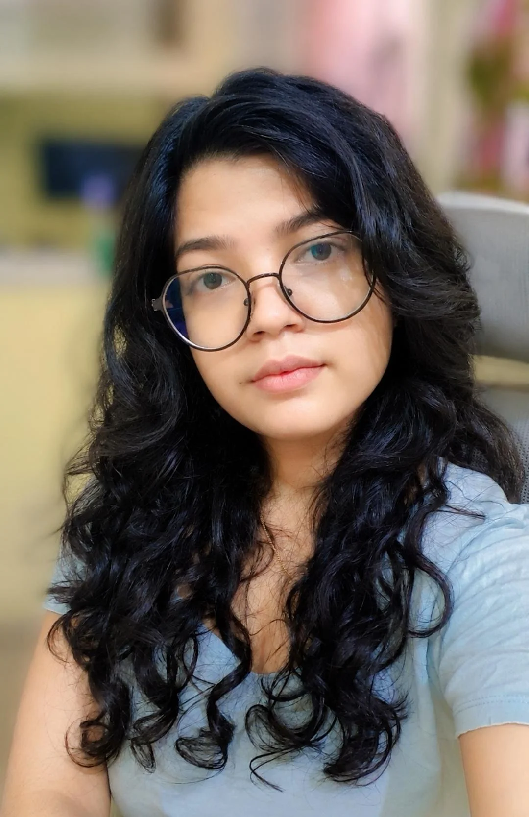 Jyoti Choudhary, facing the camera with a half-smile