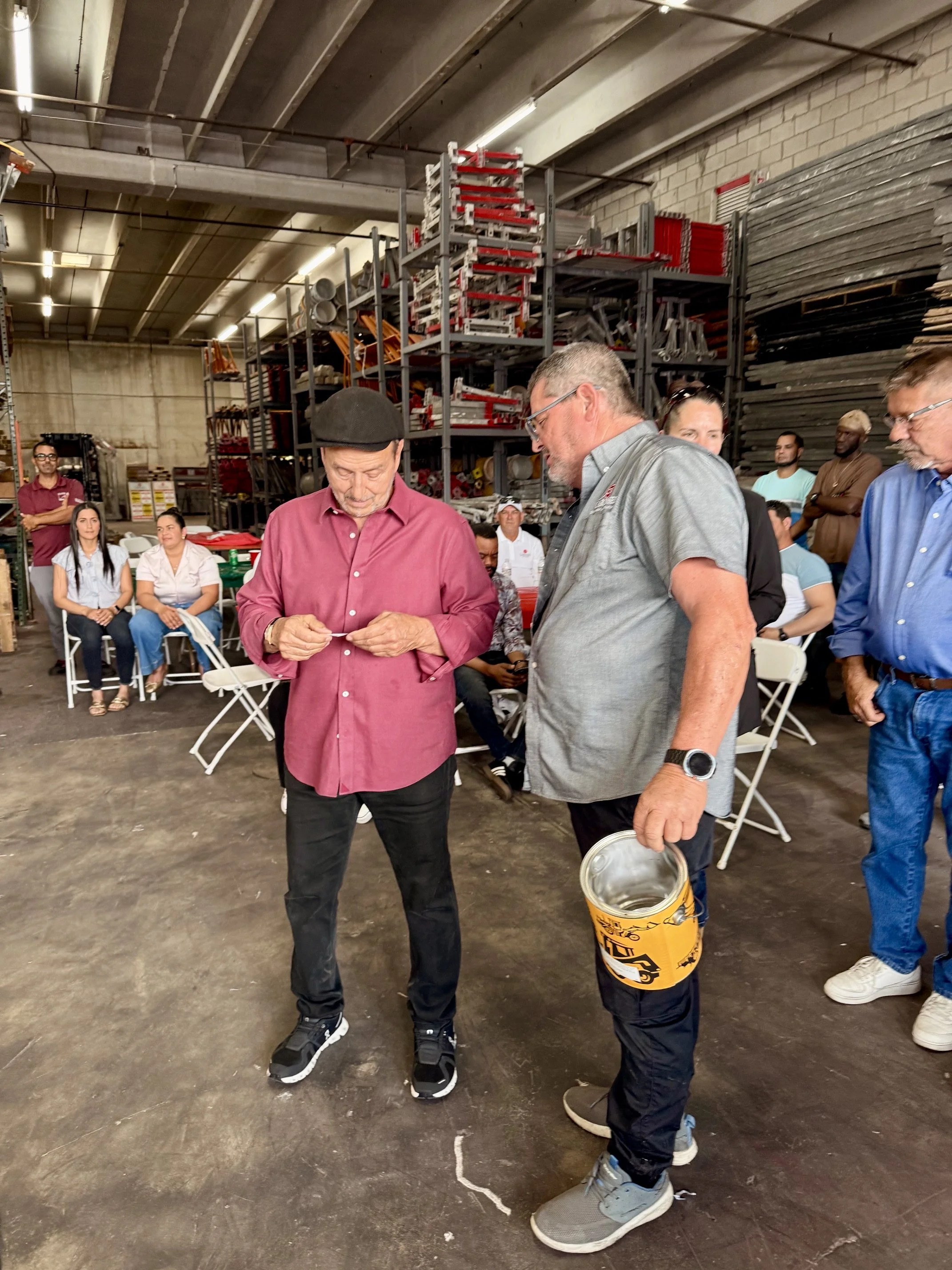 Carousel leaders raffle off prizes to employees