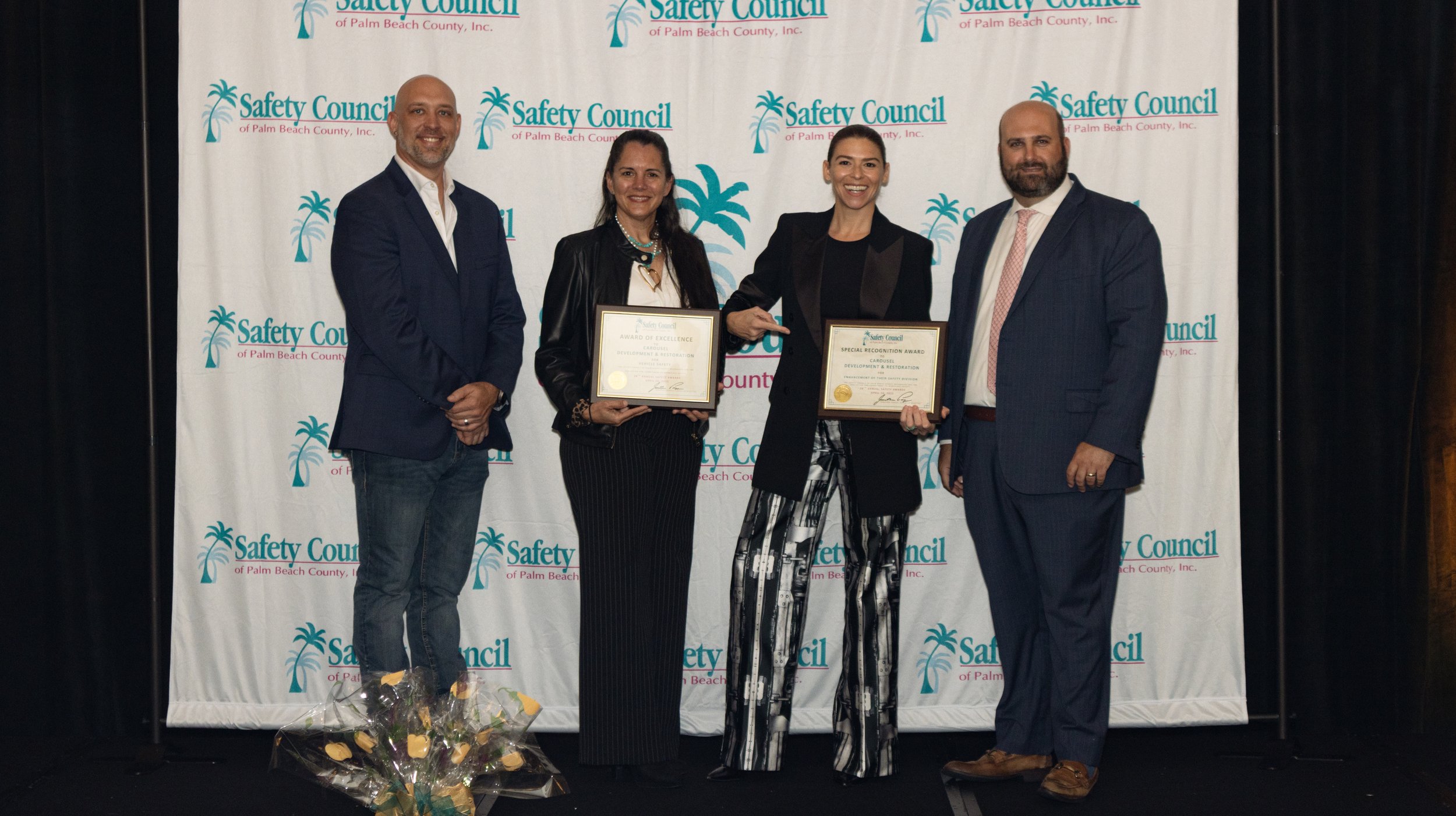 2 female CDRI employees receiving safety council award