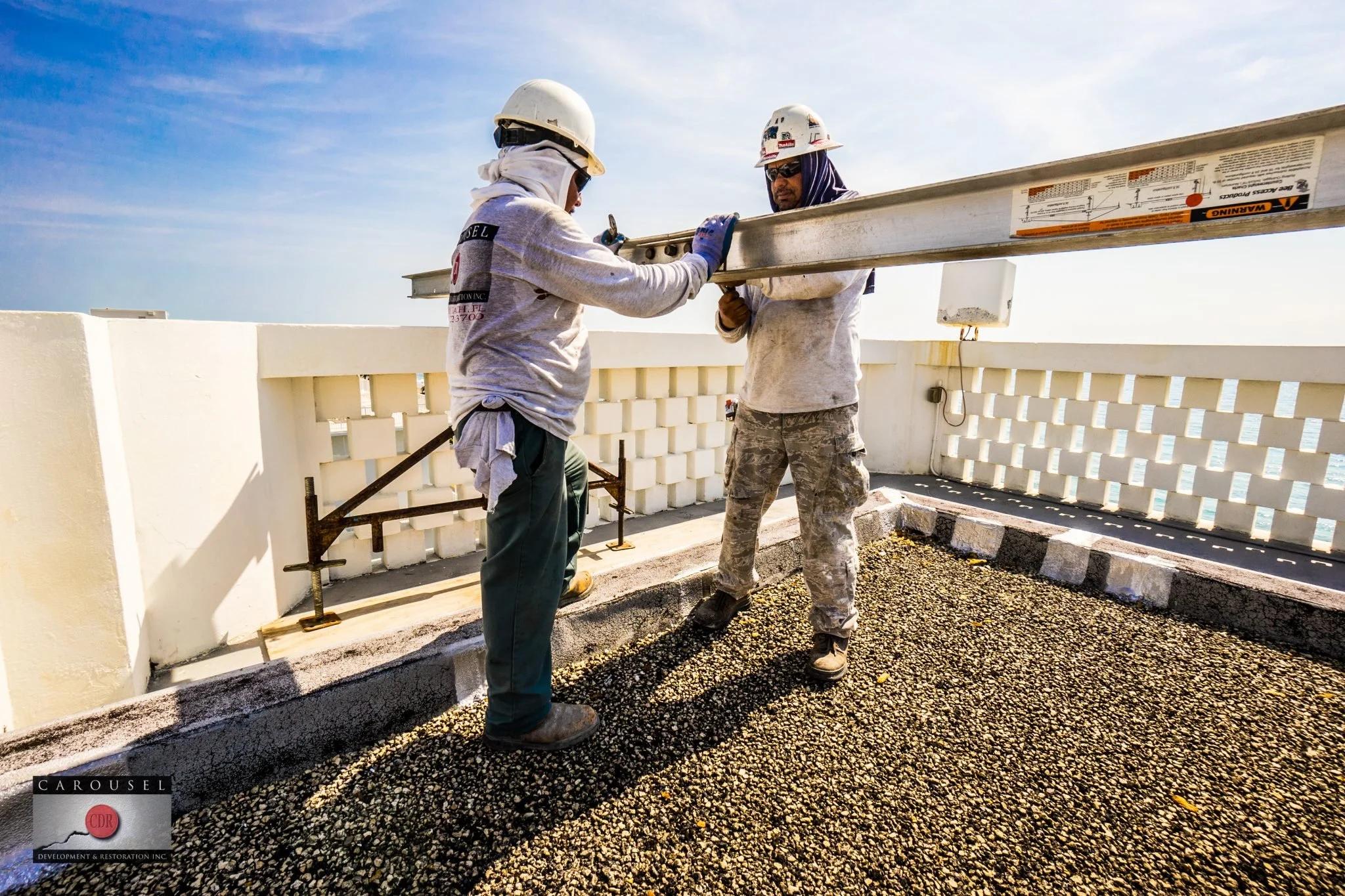Image of Kirkland House Building with two men working