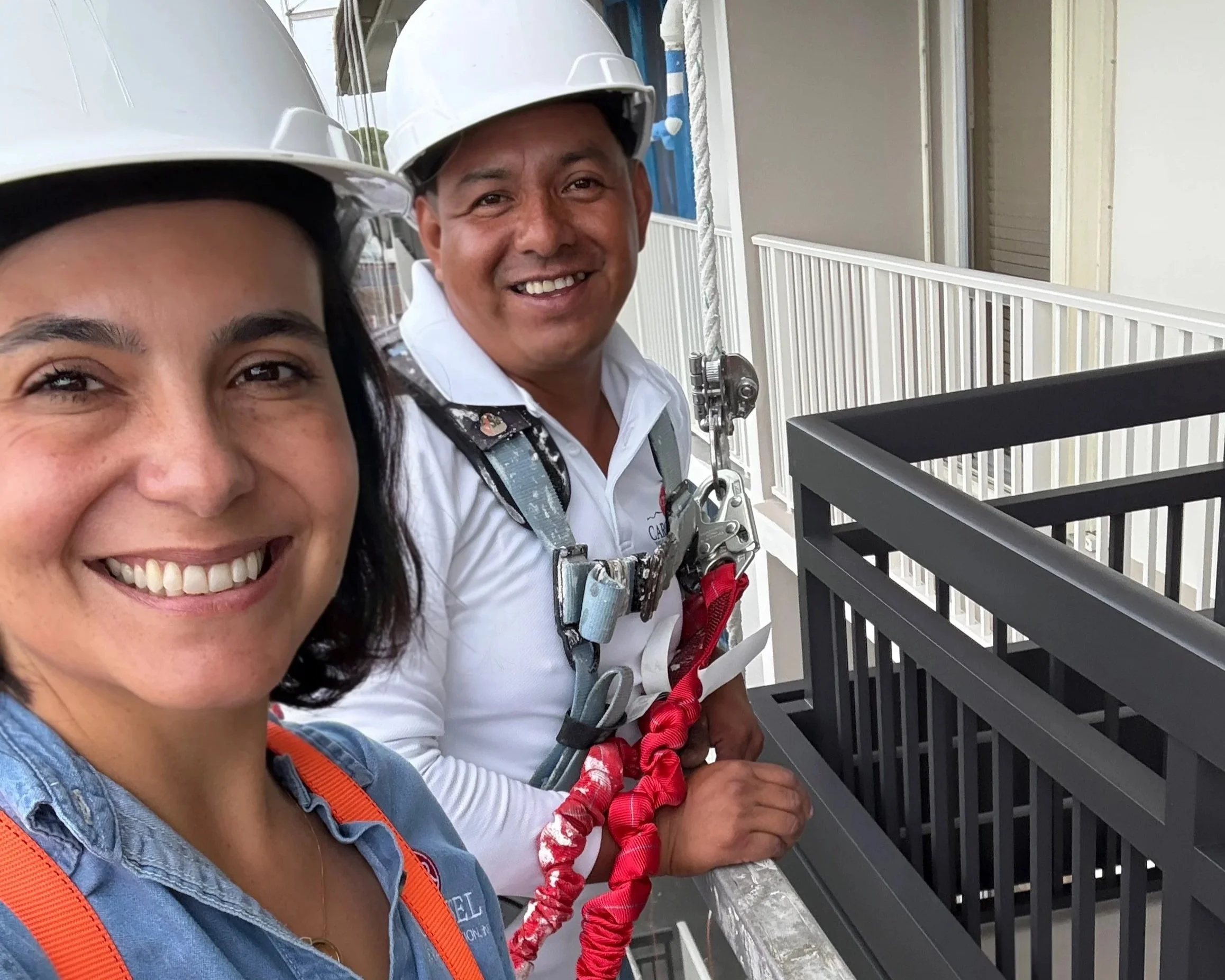 Viviana and Aguilar happy working taking a selfie