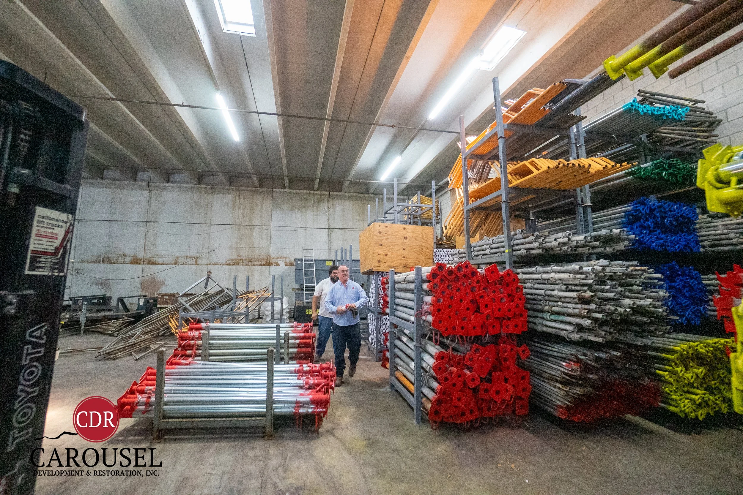 CDRI employee in warehouse