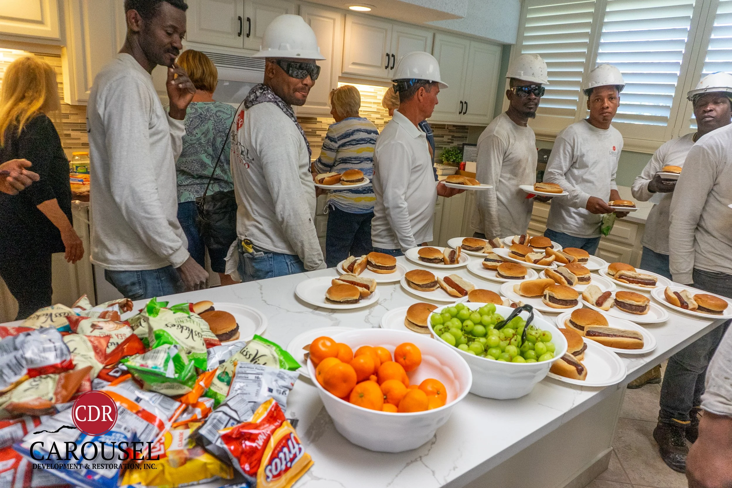 carousel employees gather for a BBQ Starlite Condo Shows Appreciation for the Carousel Team