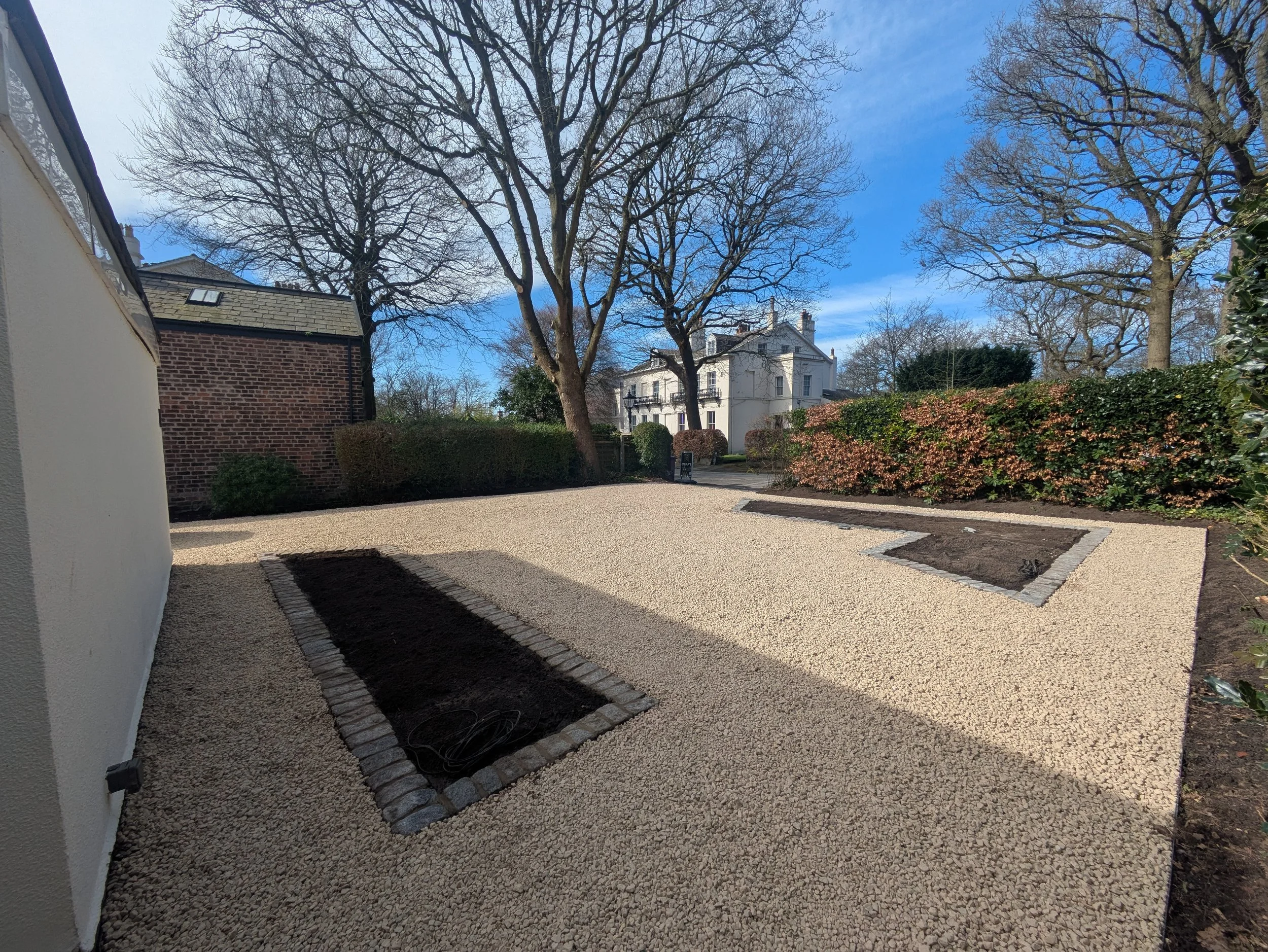 Planting Beds in driveway