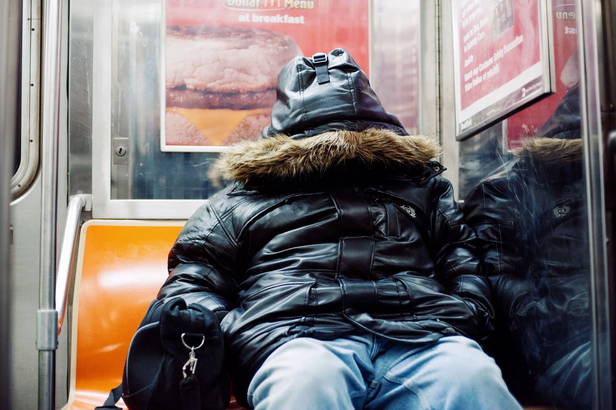 NEW_YORK_DIGITAL_STREET_PHOTOGRAPHY_MAN_SUBWAY_OBSCURED_BY_HOOD.jpg