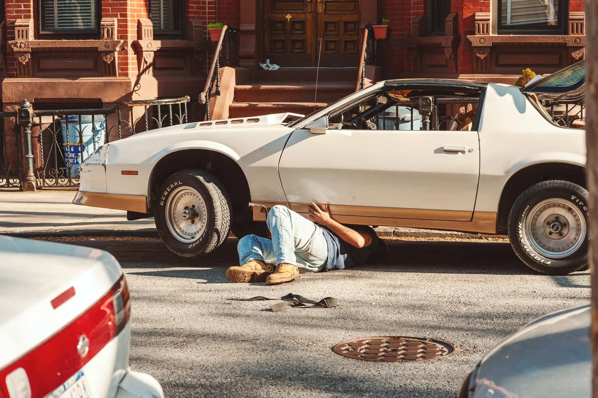 NEW_YORK_DIGITAL_STREET_PHOTOGRAPHY__REPAIR_OF_VINTAGE_SPORTS_CAR_BROOKLYN.JPG