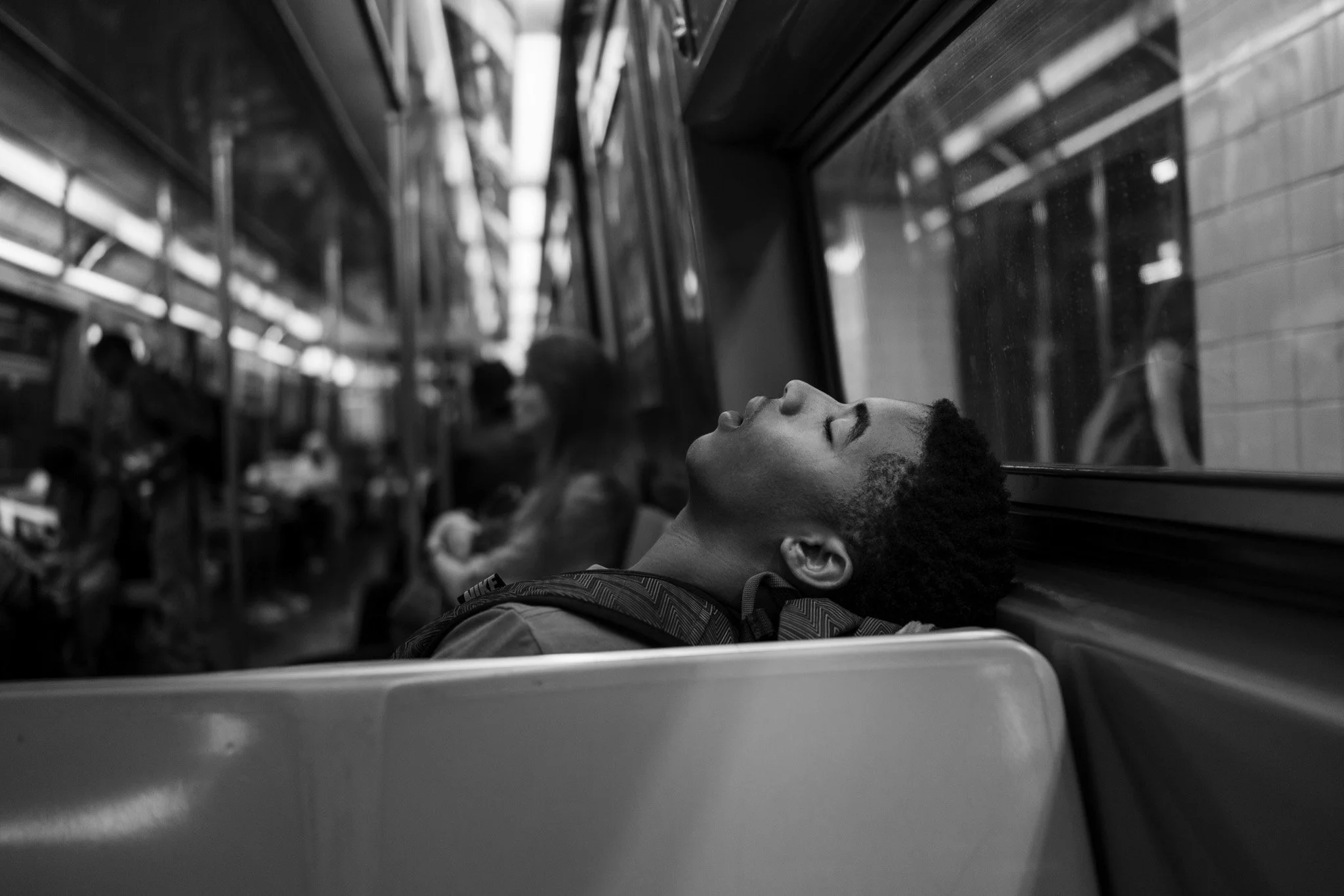 NEW_YORK_DIGITAL_STREET_PHOTOGRAPHY_YOUNG_COMMUTER_VERY_ASLEEP.jpg