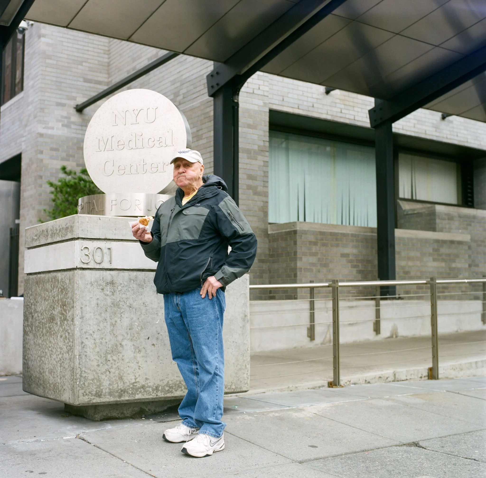 NEW_YORK_FILM_PHOTOGRAPHY_MAN_CAUGHT_CHEWING_OUTSIDE_HOSPITAL.jpg