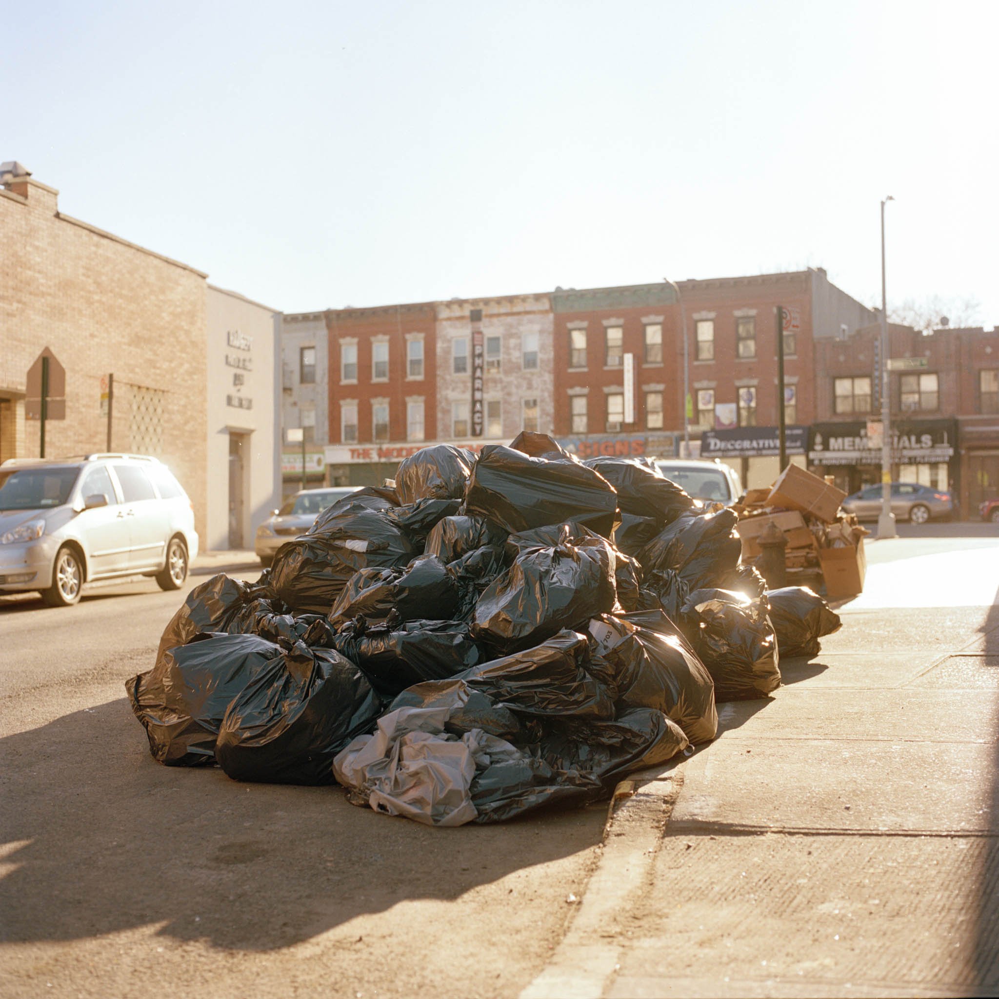 FILM_PHOTOGRAPHY_NYC_GARBAGE_SIMMERING_IN_THE_SUN.jpg