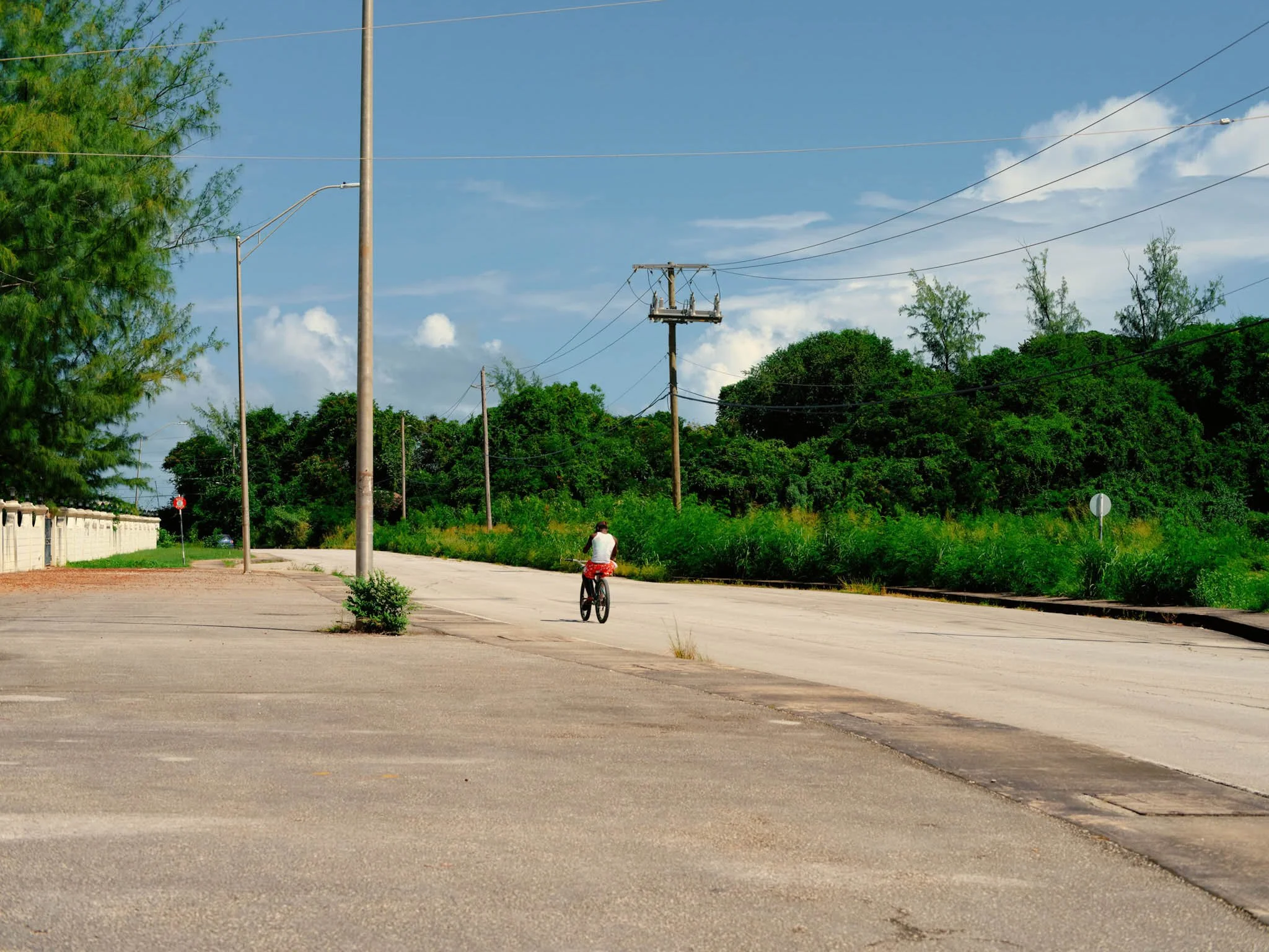 BARBADOS_A-LONE-CYCLIST-ON-A-LONELY-ROAD-IN-BARBADOS.jpg