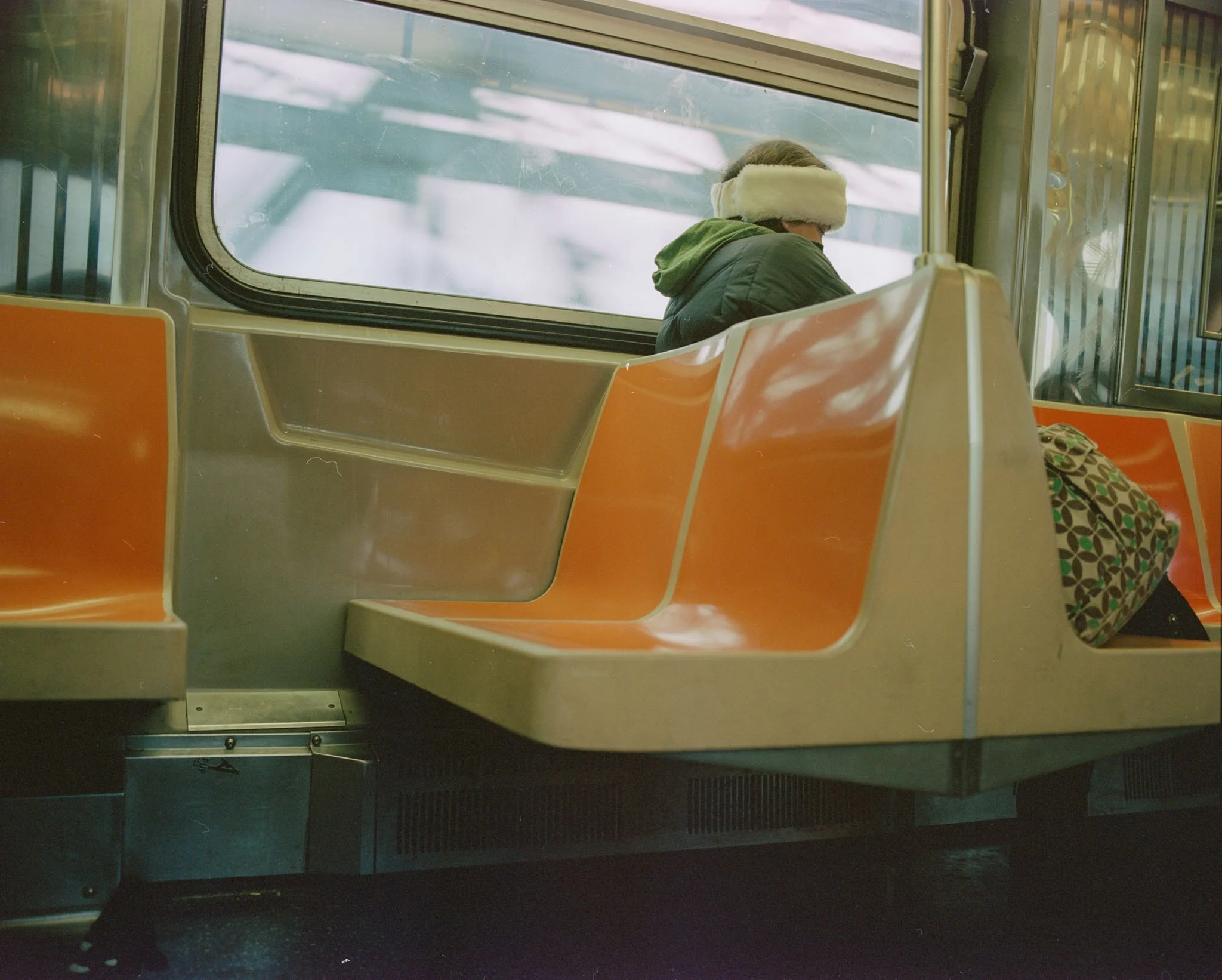 NEW_YORK_FILM_PHOTOGRAPHY_B_TRAIN_WOMAN_IN_HAT.jpg