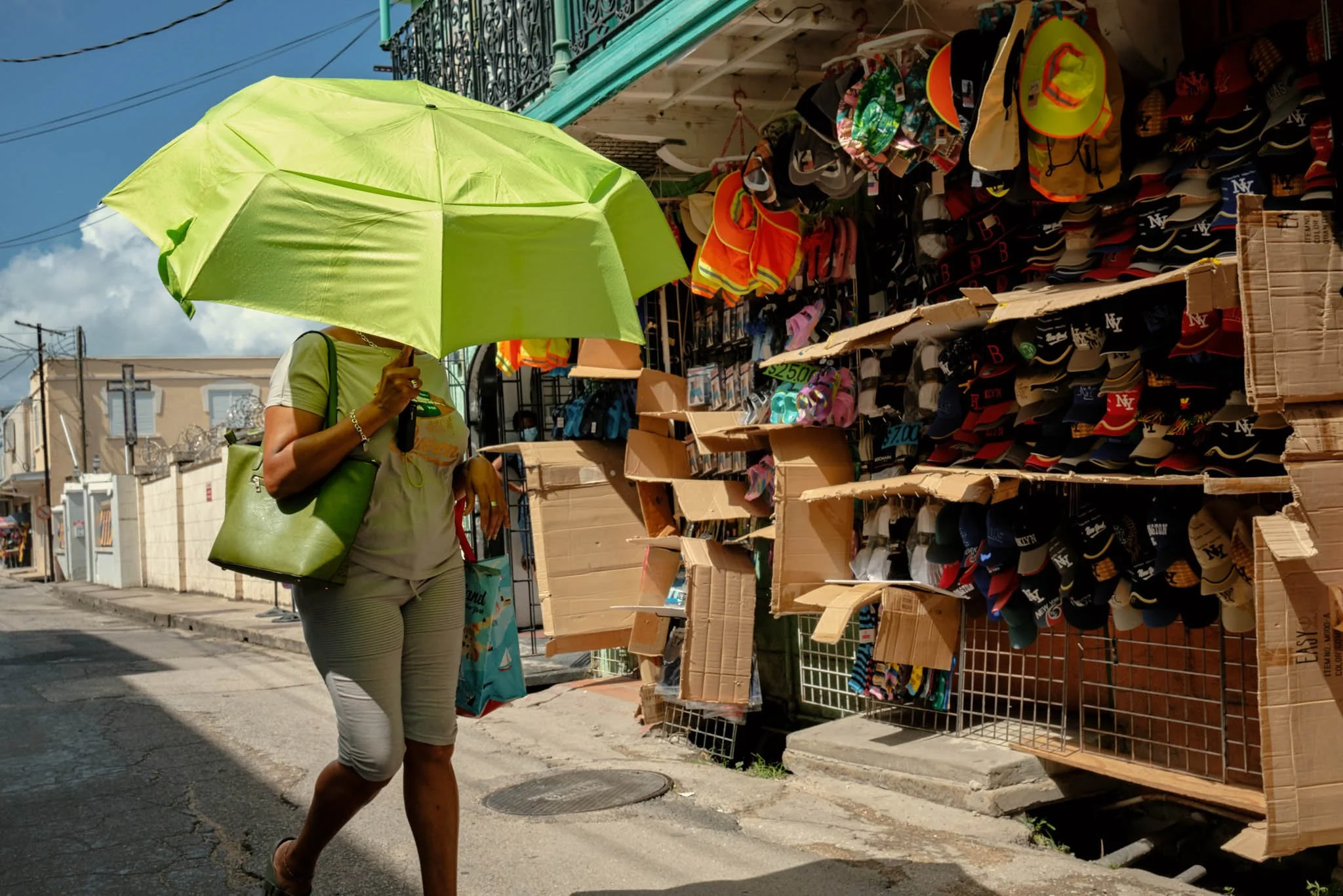 BARBADOS_WOMAN_GREEN_UMBRELLA_DAVID_PEXTON_PHOTOGRAPHY.jpg