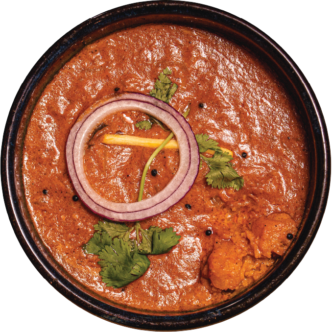 Chutnify curry topped with onion and herbs