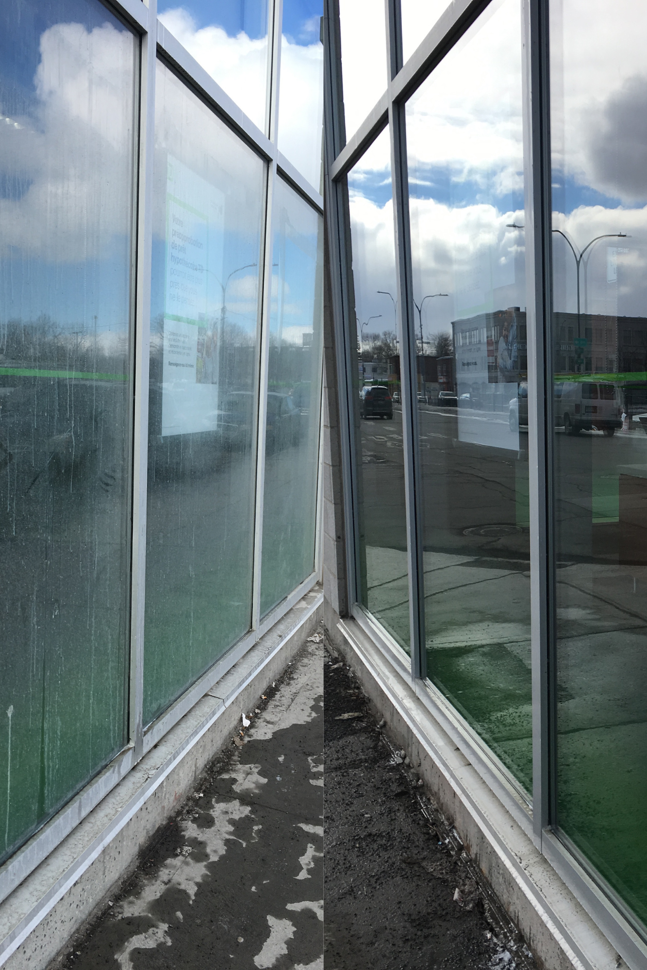 Glass windows on a busy street, showing a contrast between dirty, foggy glass on the left and clean, clear glass on the right.