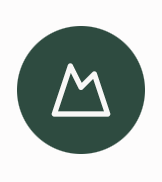 Minimalist icon of a mountain inside a dark green circle.