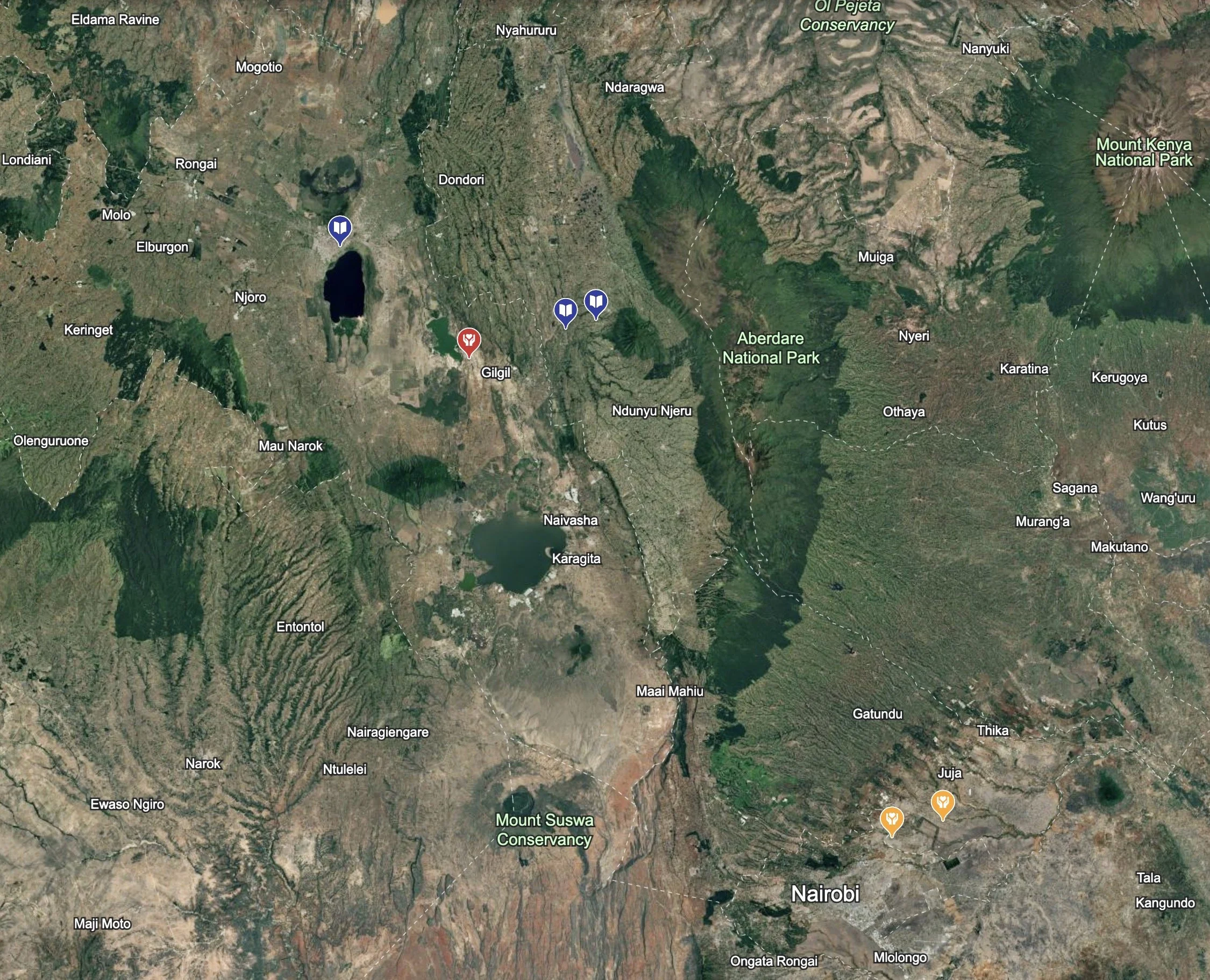 Satellite map of Nairobi and surrounding areas in Kenya, showing lakes, parks, towns, and roads.