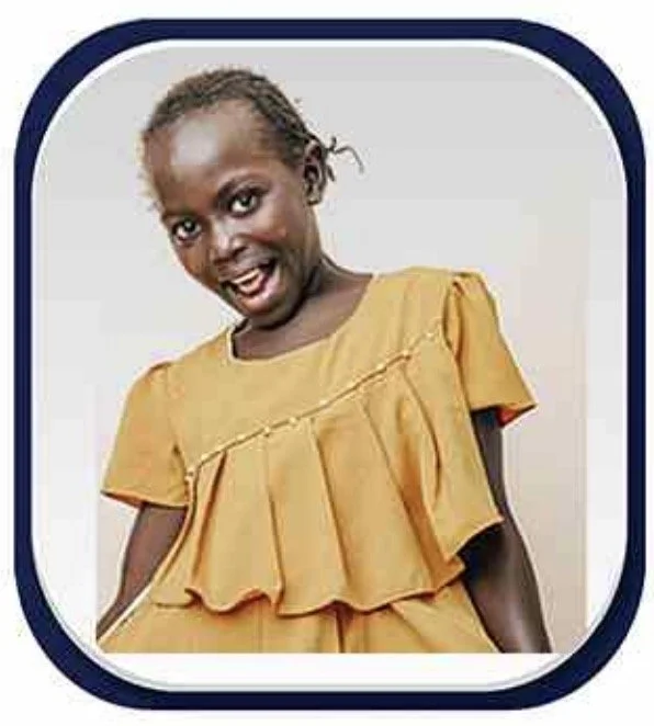 Stacy Muthoni — Born July 2012. Loves singing and playing piano.