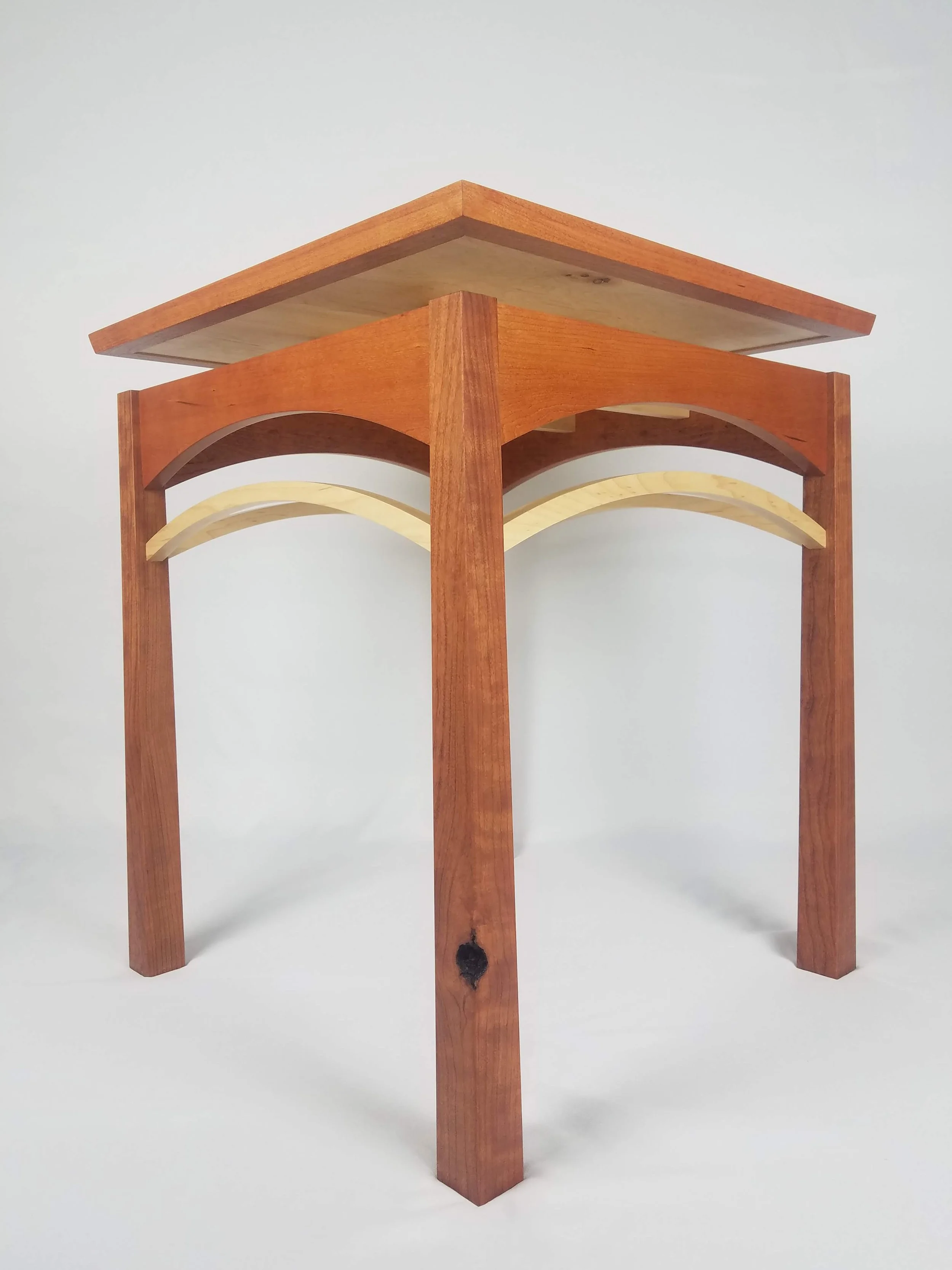 Natural knots strategically placed in legs as a subtle reminder of where this piece started earlier in its existence