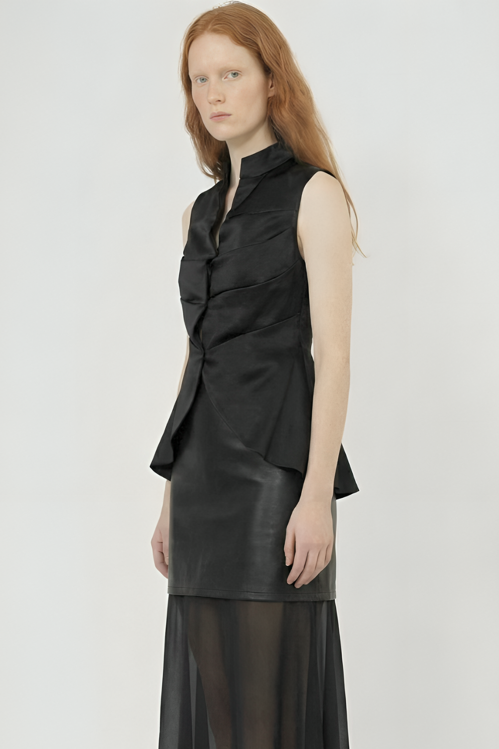 ADRIANNE WEBER Frill Top in Crisp Silk Taffeta, this sleeveless top has a simple neck closure and voluminous ruffles which animate movement