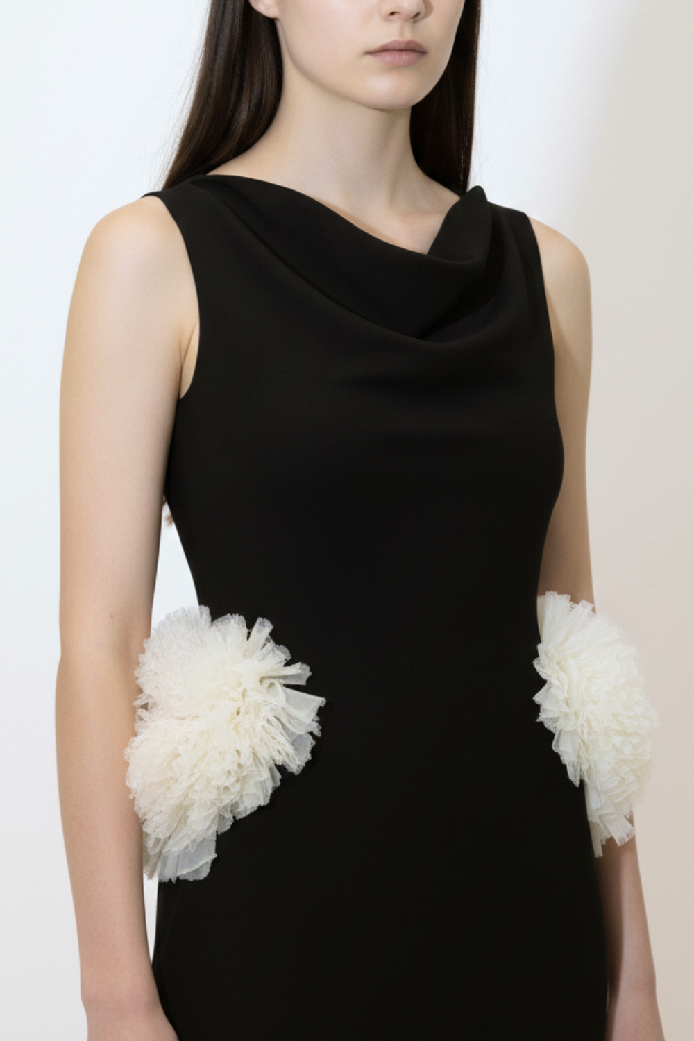 ADRIANNE WEBER Noir Rosette Gown in heavyweight matte silk  crepe featuring hand-formed tulle rosettes and an  architectural column silhouette