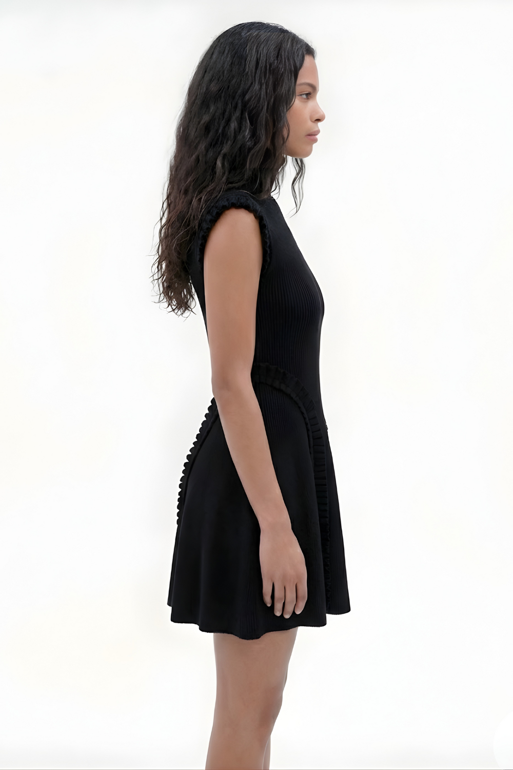 ADRIANNE WEBER Knit Dress cut from a compact stretch knit, the silhouette is sculpted yet fluid with intentional raw edges