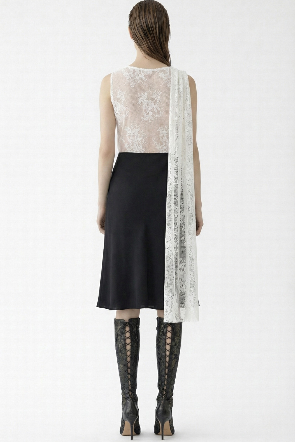 ADRIANNE WEBER Cape Sleeve Midi crafted from sheer floral lace and up-cycled silk crepe with a concealed side zip.