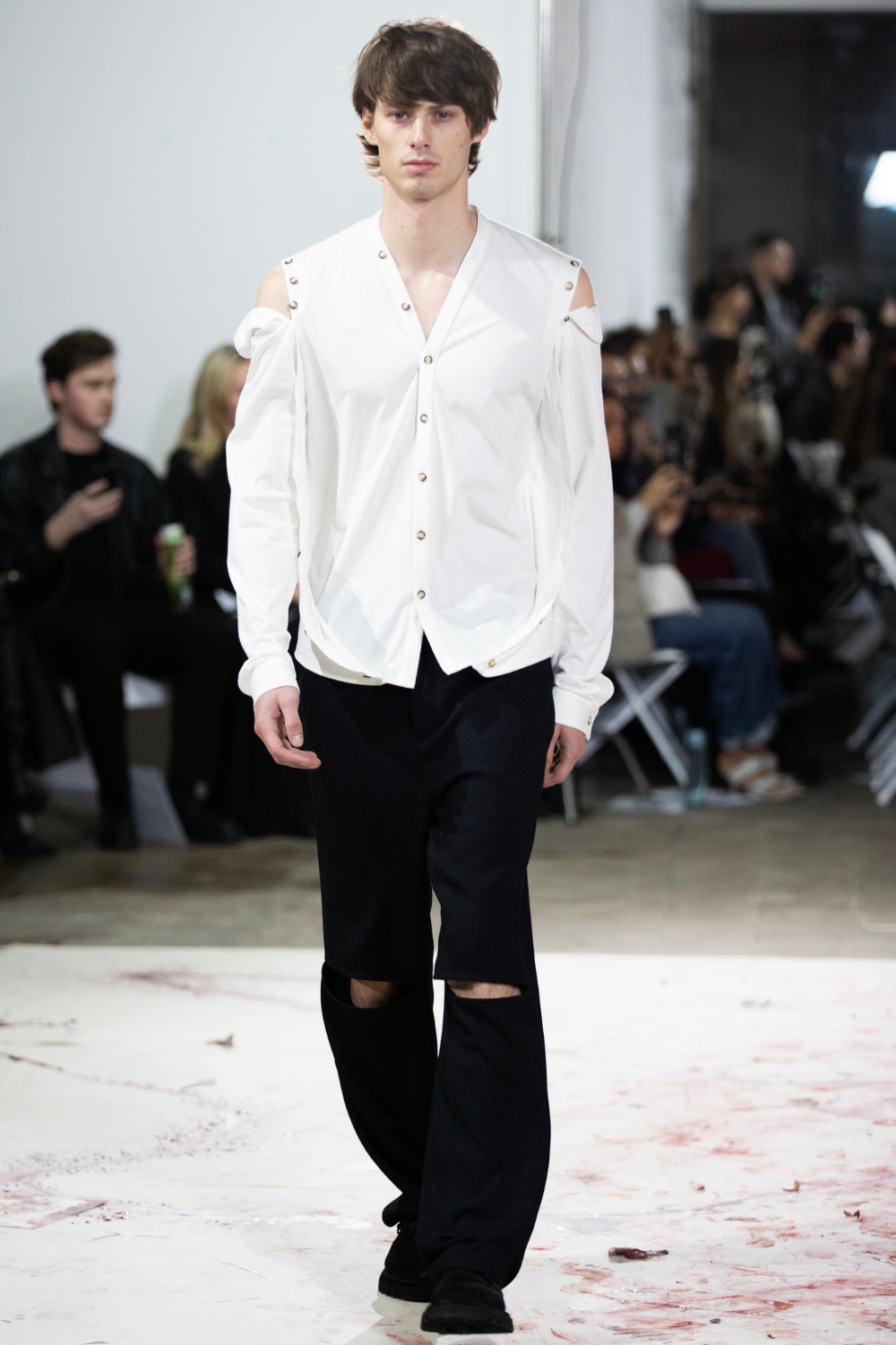 ADRIANNE WEBER Deconstructed Cardigan Him for Her made from a lightweight fabric, features a deep V-neck and button-up closure