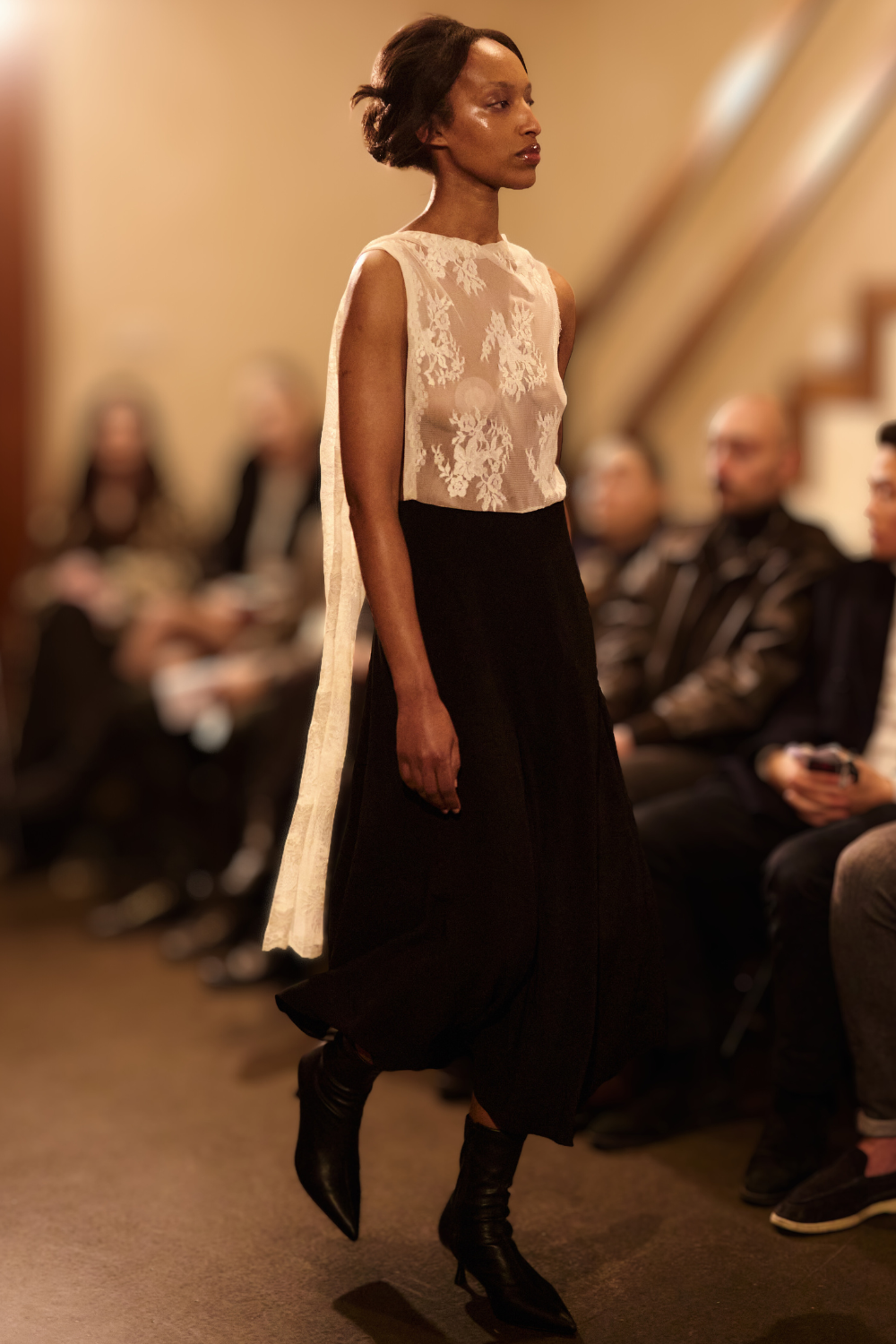 ADRIANNE WEBER Cape Sleeve Midi crafted from sheer floral lace and up-cycled silk crepe with a concealed side zip.