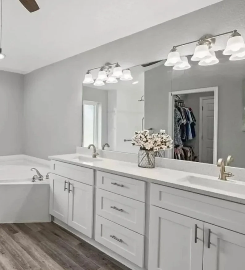 A complete cabinet redesign and  home remodel following hurricane Ian. This Rotonda home got exactly the upgrade it needed! Kitchen, bathrooms, laundry room and Entertainment center complete!