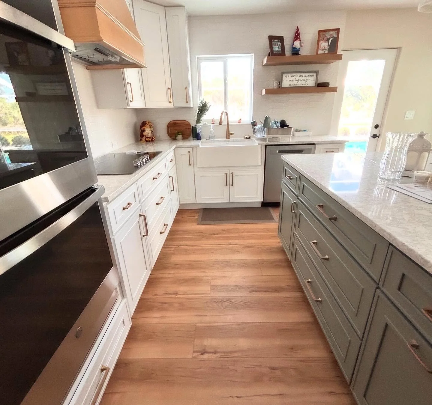 Two tone Craftsman shaker style cabinets give this Mission Valley remodel that popular farmhouse look 