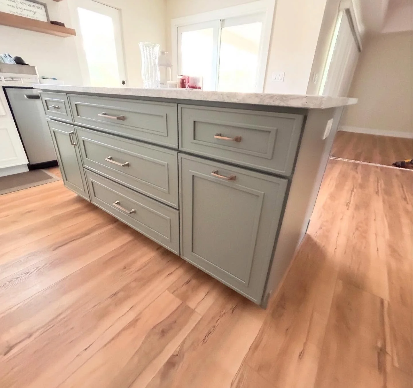 Two tone Craftsman shaker style cabinets give this Mission Valley remodel that popular farmhouse look 