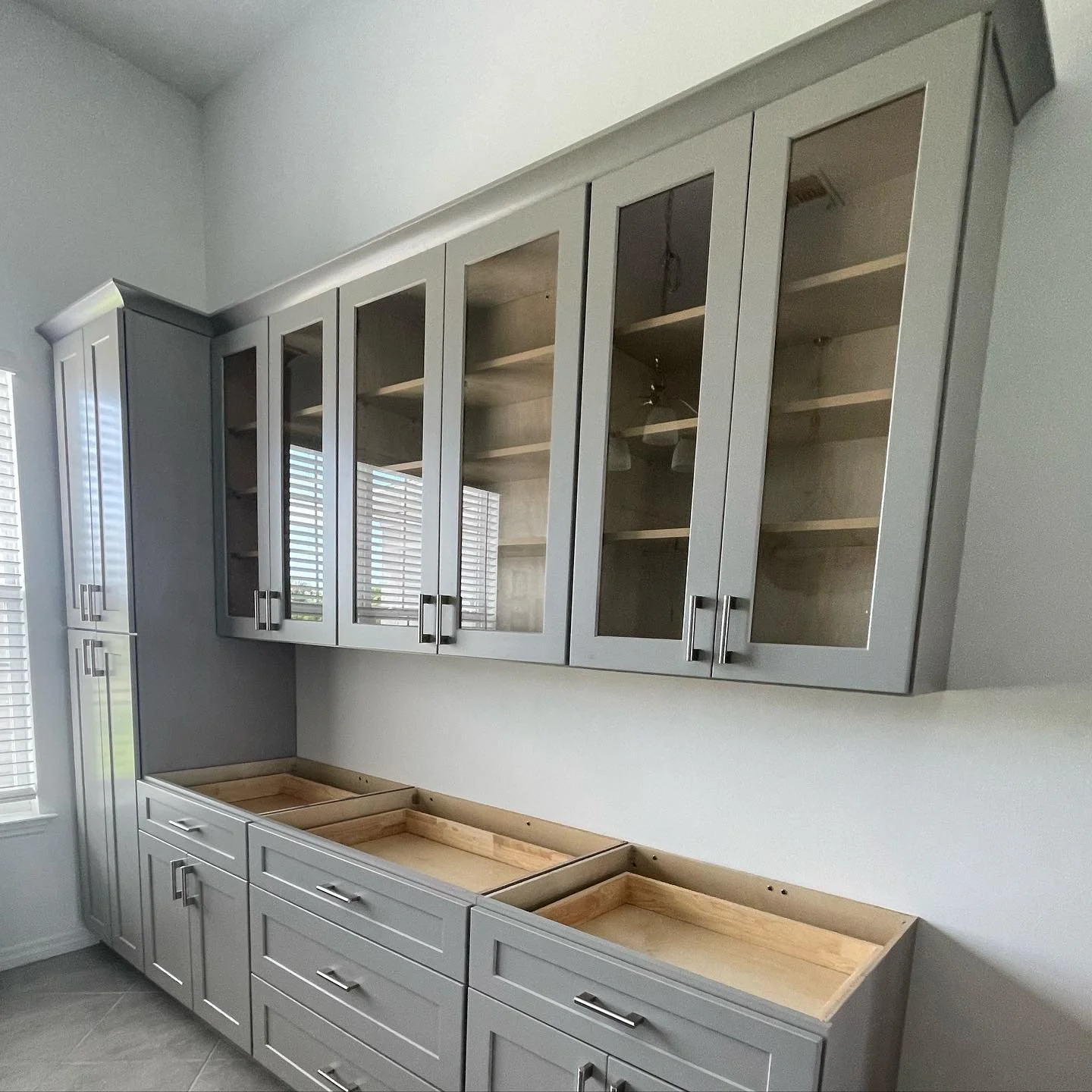 Gray shaker cabinets were used to build this custom bar for a customer in Rotonda that enjoys making his own beer!