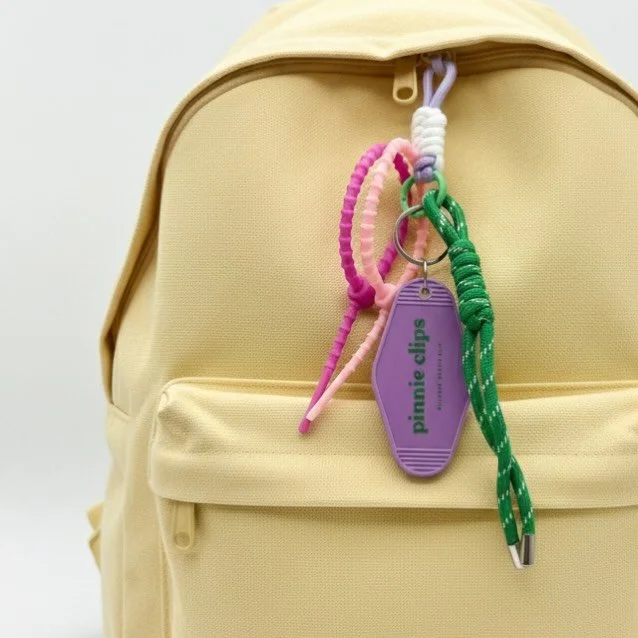 Small clip. Big confidence. 🔥

It&rsquo;s crazy how one tiny silicone pinnie clip can completely change your game.

No slipping straps. No extra fabric. No distractions.

✨ Turn your pinnie into a racerback fit
✨ Gather and tuck extra fabric at the 