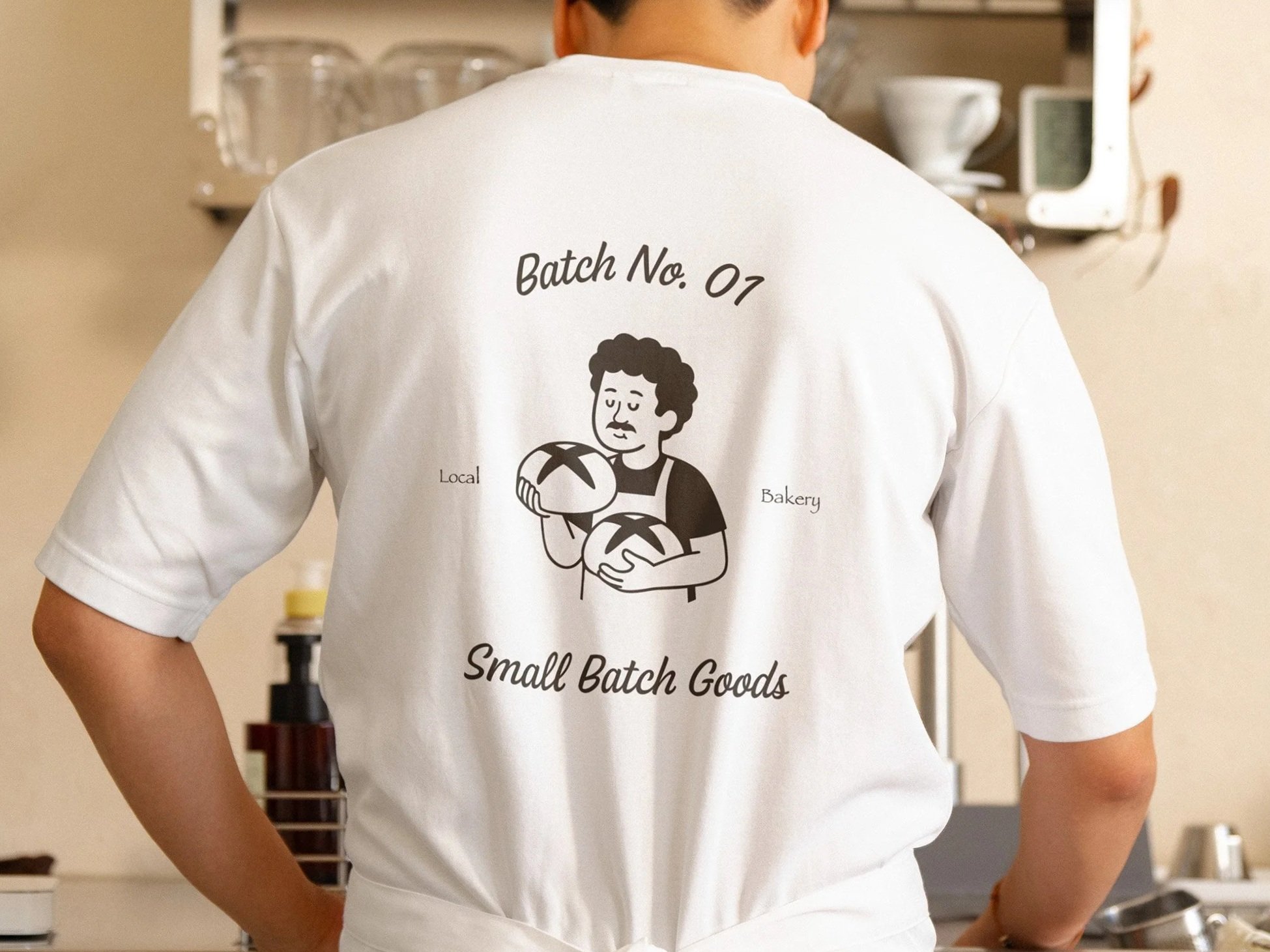 white t-shirt with brown logo in the center