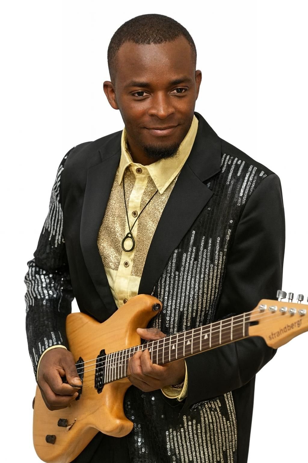 lead guitarist Reginald Duvillage (Dean Regy) on stage with the R.M.B. Band, performing live. 