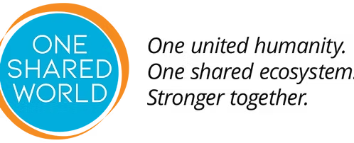 Graphic with a blue circle containing white text that says "ONE SHARED WORLD". The circle is partly enclosed by an orange arc, and there is purple and orange text and design elements around it.