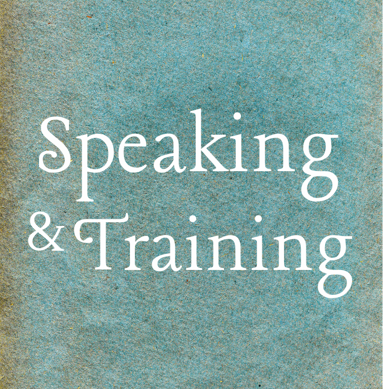 Text on a textured blue-green background that reads 'Speaking & Training' in white letters.