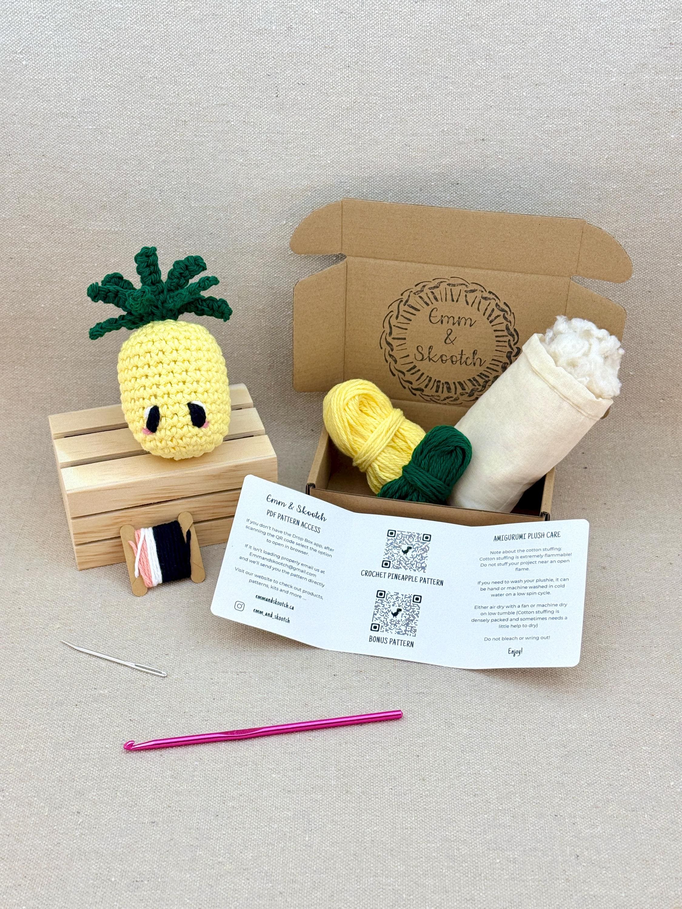 A finished butter yellow amigurumi pineapple with the DIY Crochet Kit
